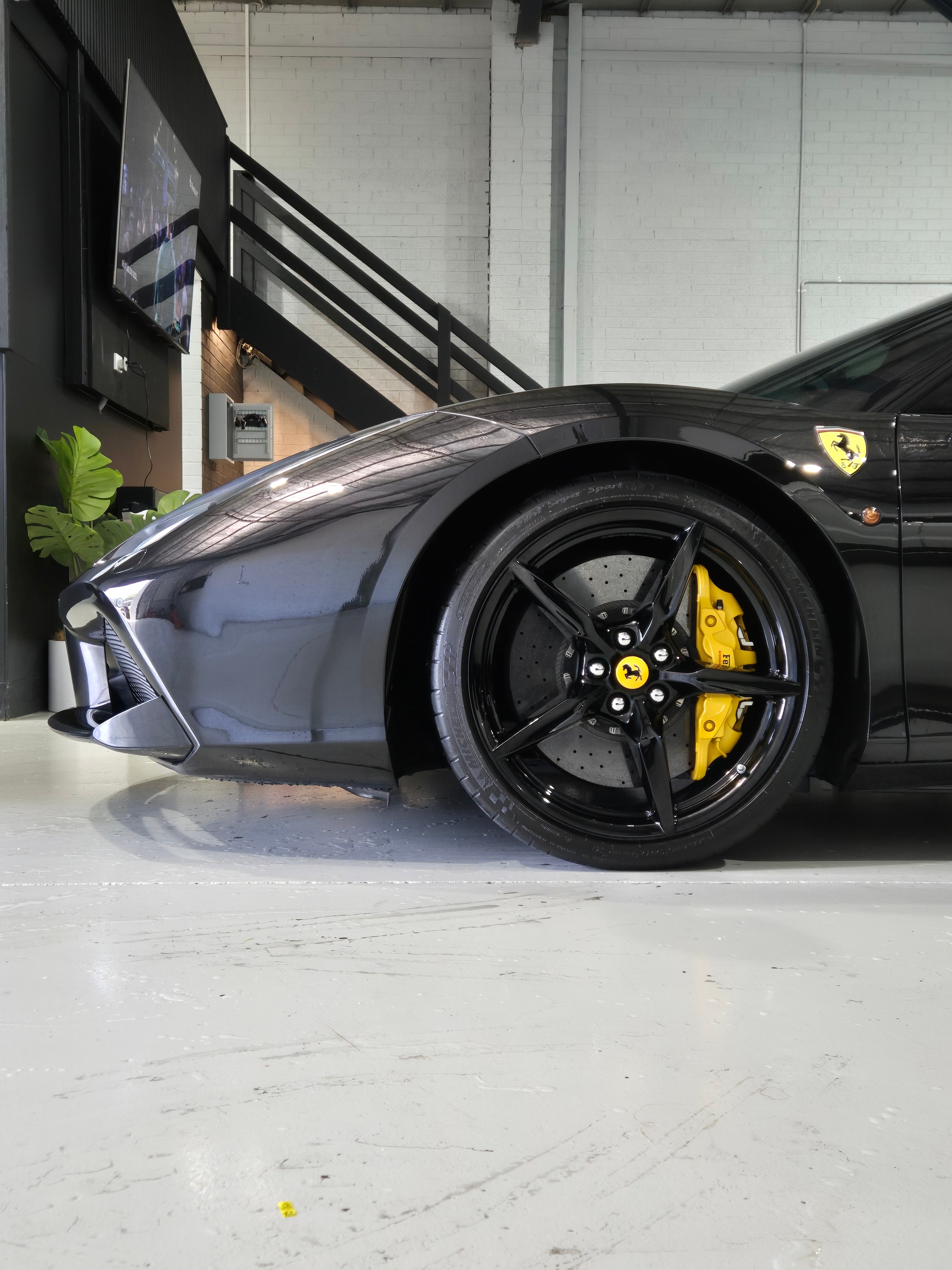 Black Ferrari with ceramic coated wheels