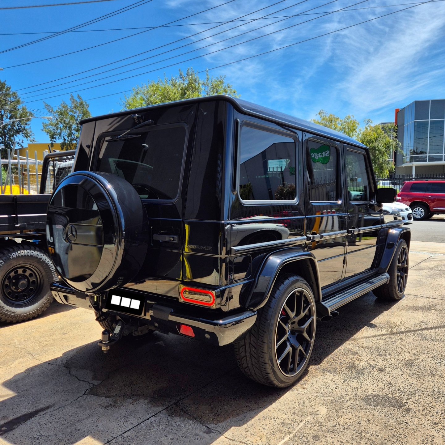 Black G-Wagon with pristine paint finish